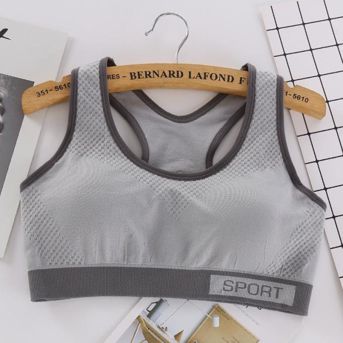 Camisetas sin mangas sólidas a prueba de choques de la Rápido-sequedad de Wicking de la ropa interior de la aptitud corriente de las mujeres del sujetador de los deportes de la moda del color de Macaron