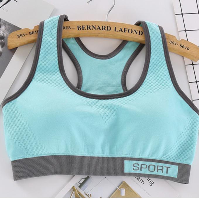 Camisetas sin mangas sólidas a prueba de choques de la Rápido-sequedad de Wicking de la ropa interior de la aptitud corriente de las mujeres del sujetador de los deportes de la moda del color de Macaron