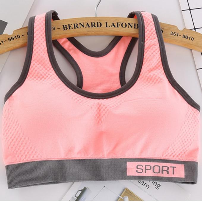 Camisetas sin mangas sólidas a prueba de choques de la Rápido-sequedad de Wicking de la ropa interior de la aptitud corriente de las mujeres del sujetador de los deportes de la moda del color de Macaron