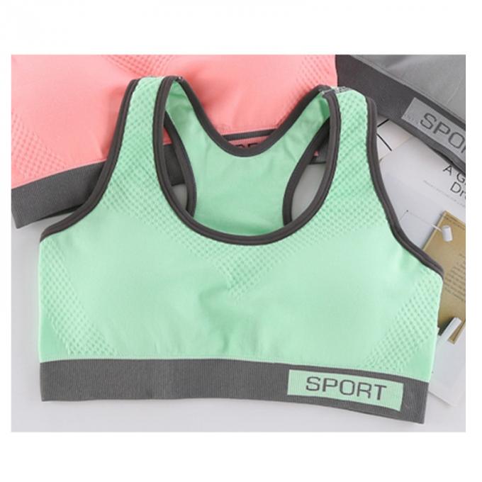 Camisetas sin mangas sólidas a prueba de choques de la Rápido-sequedad de Wicking de la ropa interior de la aptitud corriente de las mujeres del sujetador de los deportes de la moda del color de Macaron