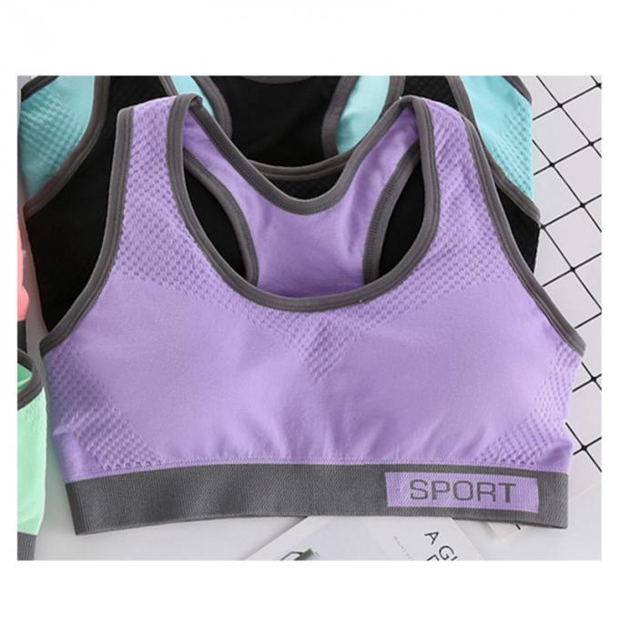 Camisetas sin mangas sólidas a prueba de choques de la Rápido-sequedad de Wicking de la ropa interior de la aptitud corriente de las mujeres del sujetador de los deportes de la moda del color de Macaron