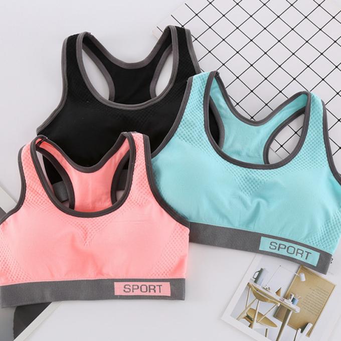 Camisetas sin mangas sólidas a prueba de choques de la Rápido-sequedad de Wicking de la ropa interior de la aptitud corriente de las mujeres del sujetador de los deportes de la moda del color de Macaron