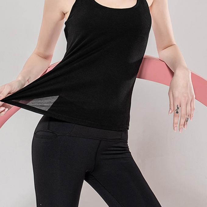 Los deportes al por mayor conceden la ropa de la aptitud de las mujeres que funciona con belleza superior detrás se divierten el top flojo superior de la yoga con el sujetador