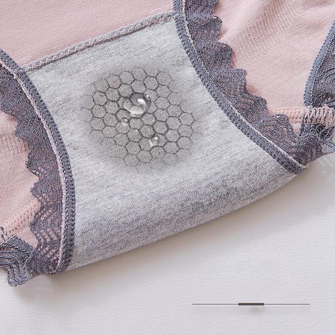 Las bragas al por mayor de la ropa interior atan las bragas del bikini para mujeres inconsútiles de la ropa interior del algodón de la cintura de las mujeres las mediados de
