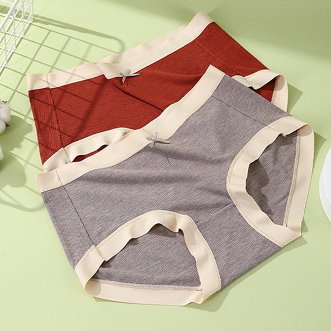 La ropa interior respirable del tamaño extra grande de la cintura de la muchacha al por mayor del algodón medio de Traceless 3 capas se escapa las bragas de las mujeres de la prueba
