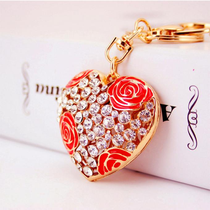 Las señoras Diamante-tachonadas creativas perfuman el metal femenino Crystal Keychain del diamante artificial de los accesorios del bolso de la cadena dominante de la botella