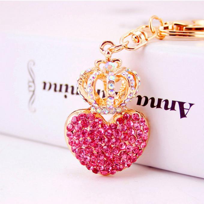 Las señoras Diamante-tachonadas creativas perfuman el metal femenino Crystal Keychain del diamante artificial de los accesorios del bolso de la cadena dominante de la botella