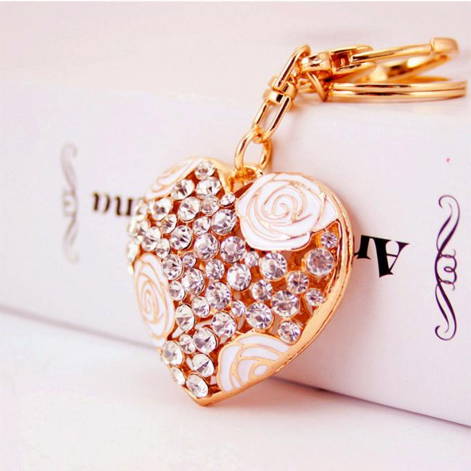 Las señoras Diamante-tachonadas creativas perfuman el metal femenino Crystal Keychain del diamante artificial de los accesorios del bolso de la cadena dominante de la botella