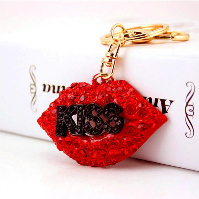 Las señoras Diamante-tachonadas creativas perfuman el metal femenino Crystal Keychain del diamante artificial de los accesorios del bolso de la cadena dominante de la botella